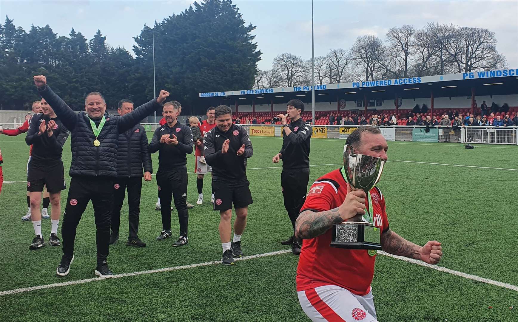 Chatham player-assistant manager Danny Kedwell celebrates with the trophy