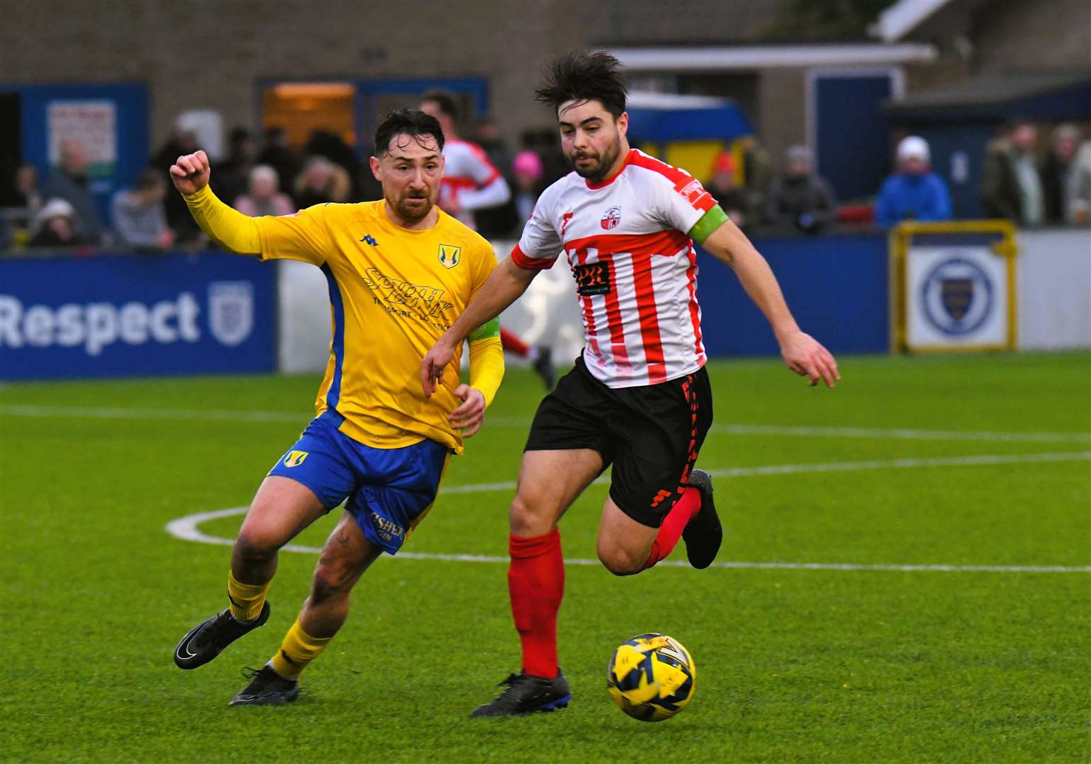 Sheppey United's Richie Hamill helps his side to three points at Lancing Picture: Marc Richards