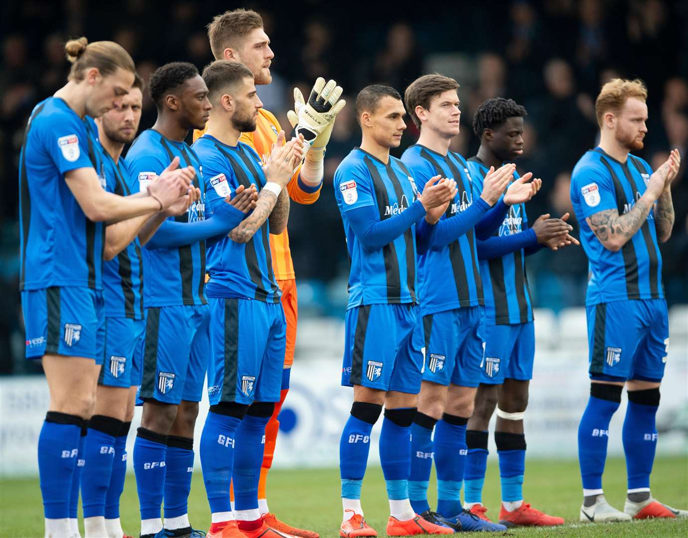 The Gills players pay their respects to England legend Gordon Banks with a minute's applause Picture: Ady Kerry