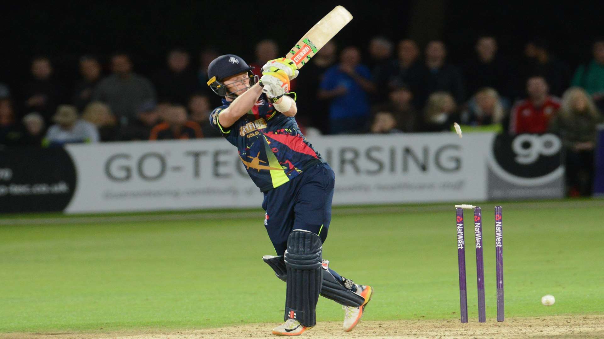 Sam Billings is bowled for 15 by Surrey's Moises Henriques. Picture: Gary Browne