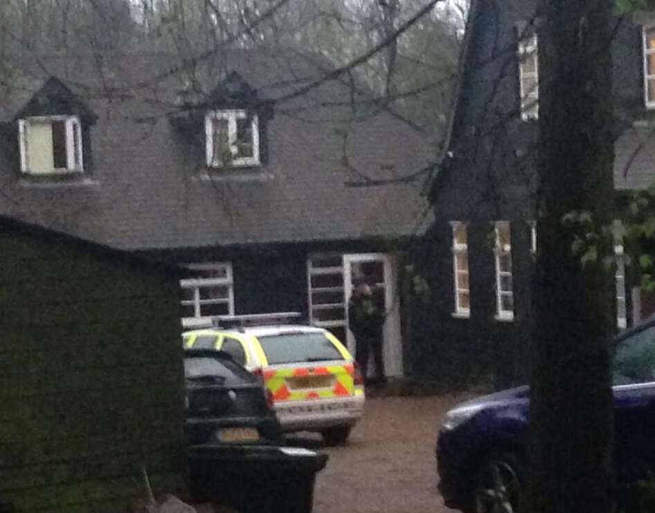 Police stand guard outside Peaches Geldof's house following her death