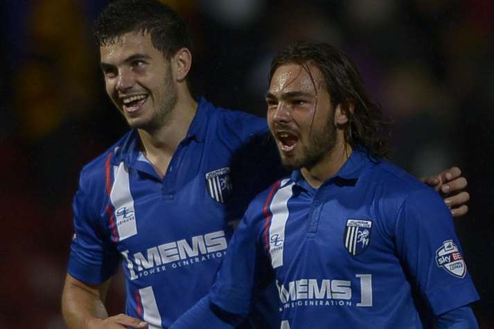 John Egan with Bradley Dack Picture: Barry Goodwin