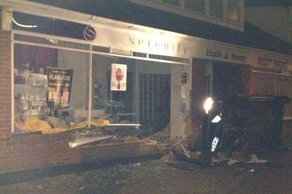 A car driven by Aaron Young after smashing into the Serenity salon. Picture: Rebecca Nutt