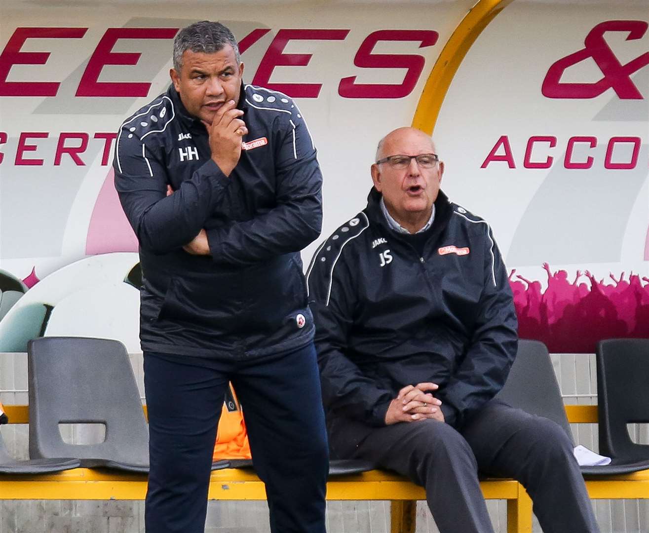 John Still often stays seated these days while Hakan Hayrettin runs things on the touchline Picture: Matthew Walker.