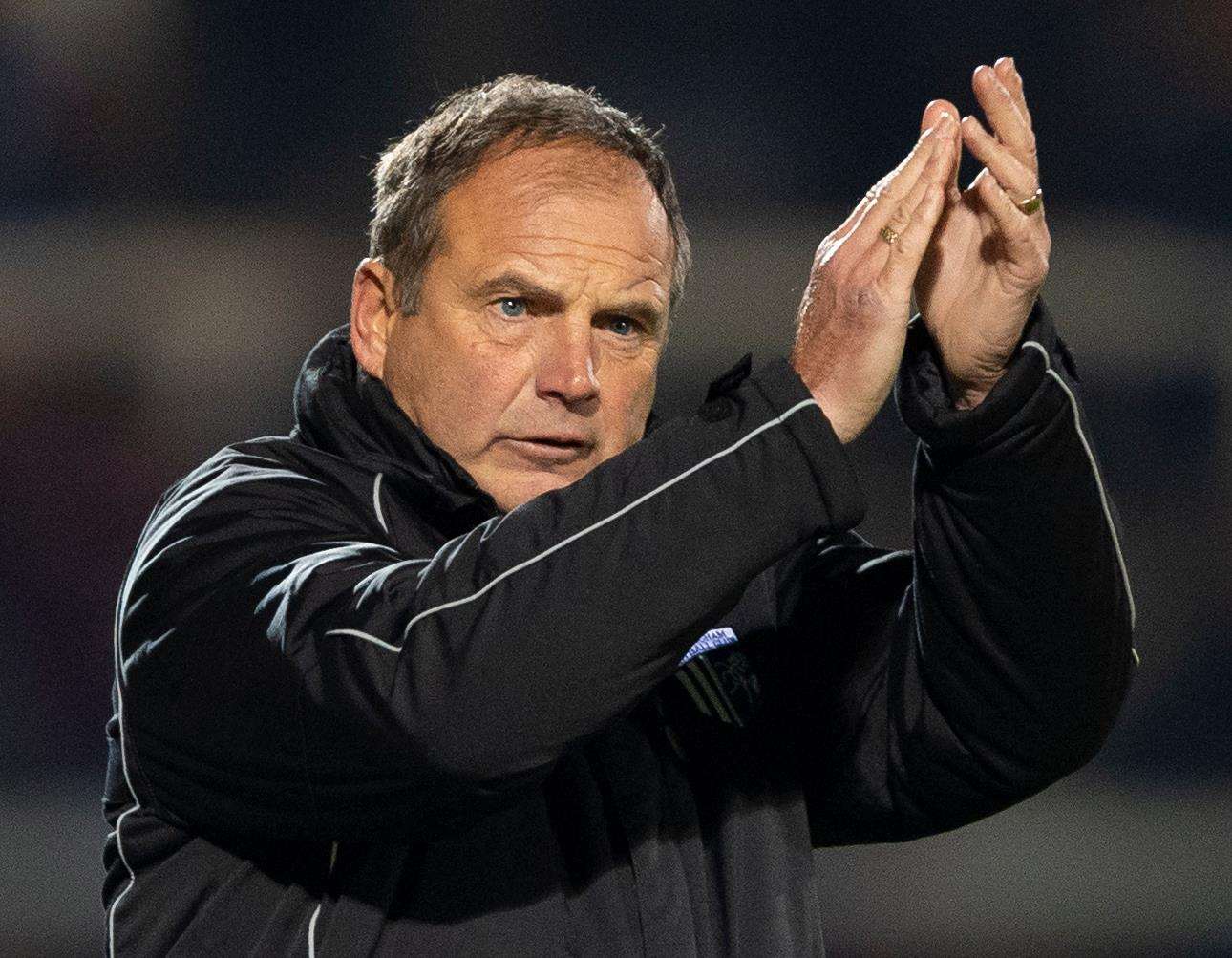 Gillingham boss Steve Lovell claps the fans for making the journey north. Picture: Ady Kerry