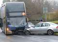 Two in hospital after crash between car and bus