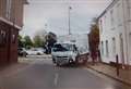 Shocking moment bin lorry mounts path and narrowly misses children