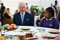 Charles makes birthday visit to surplus food project