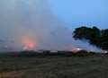 Crews tackle hay fire 