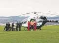 Woman airlifted after falling ill