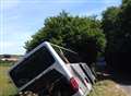 Coach full of tourists topples into a ditch 