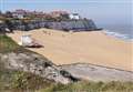 Police escort London family off beach