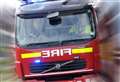 Woman treated for smoke inhalation after flat fire