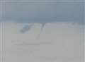 Onlookers mesmerised by twister over sea