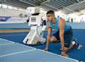 Olympian tests his metal... against a robot