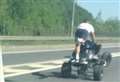 Quad rider spotted doing wheelie 