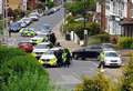 Armed police search after woman attacked