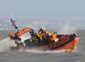 Lifeboat launched as clothes found alight on beach