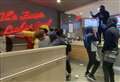 Teenagers invade KFC to film music video