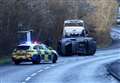 BMW mangled after rolling over in crash