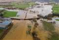 Photos show extent of flooding as roads remain shut