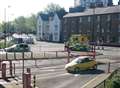 Woman hit by car in town centre crash