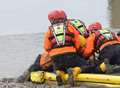 Fire crews rescue pensioner from mud