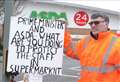 Dad mounts Asda store protest