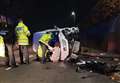 Van flips after hitting telegraph pole