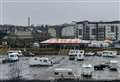 Travellers set up on car park