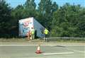 Lorry leaves M20 and comes to rest near trees