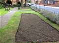 Volunteers forced to dig up memorial garden