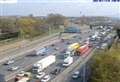 Six vehicles damaged as debris rains down from bridge over M25