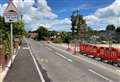 Road closed after car ploughs into telegraph pole