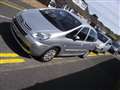 Line painters dodge parked cars