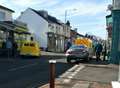 Crash involving car and van blocks busy road