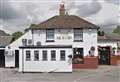 Third arrest after man suffers broken bones in attack outside pub