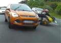 Moment motorcyclist thrown off bike in crash