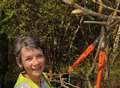 Volunteers working hard to keep wood looking good