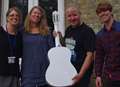  Guitar festival boosts school 