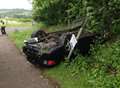 Car smashes into bus stop