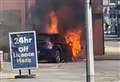 Car bursts into flames just metres from petrol pumps