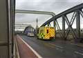 Motorbike and car crash on bridge