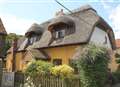 Thatched cottage is tucked away