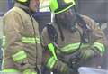 Person injured in garage fire