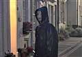 'Vandal' in creepy mask 'smashes shop windows'