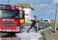 Foam covers road after car fire