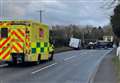 Road blocked after car and van collide