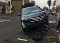 Car smashes into traffic lights