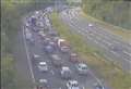 Long queues on M2 after crash involving car and motorbike